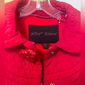 Betsey Johnson red quilted coat with signature heart button detail. Size: XS